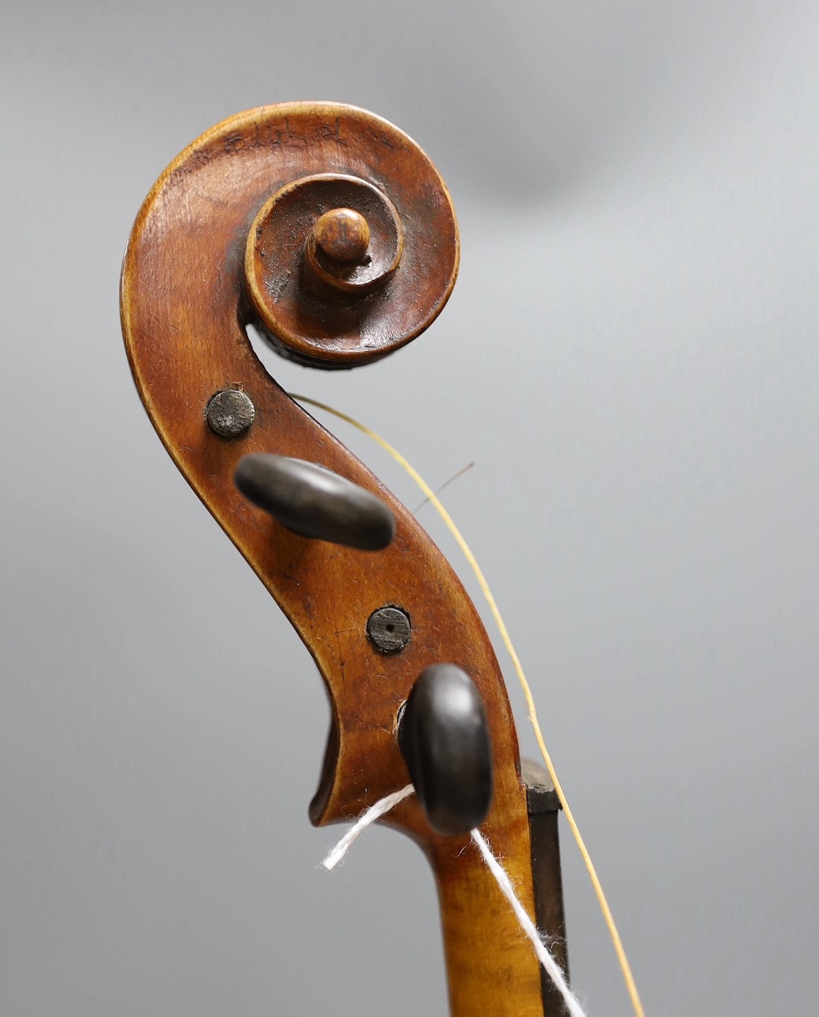 A cased 19th century violin, labelled Stradivarius 1690, with a Dodd bow
